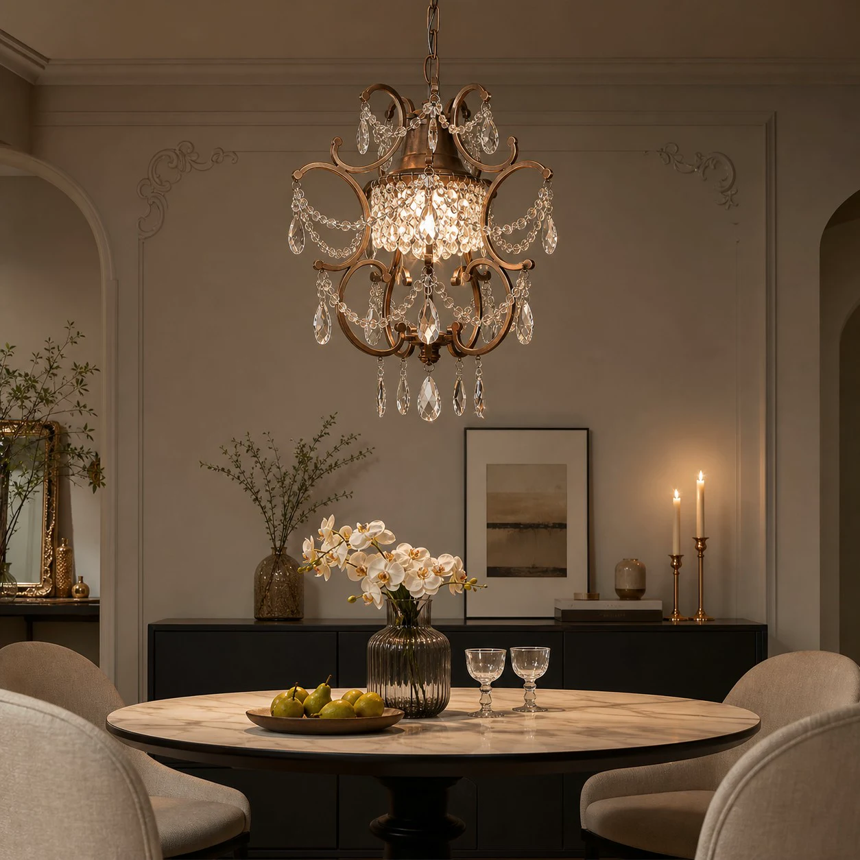 Clear crystal pendant light above a dining table